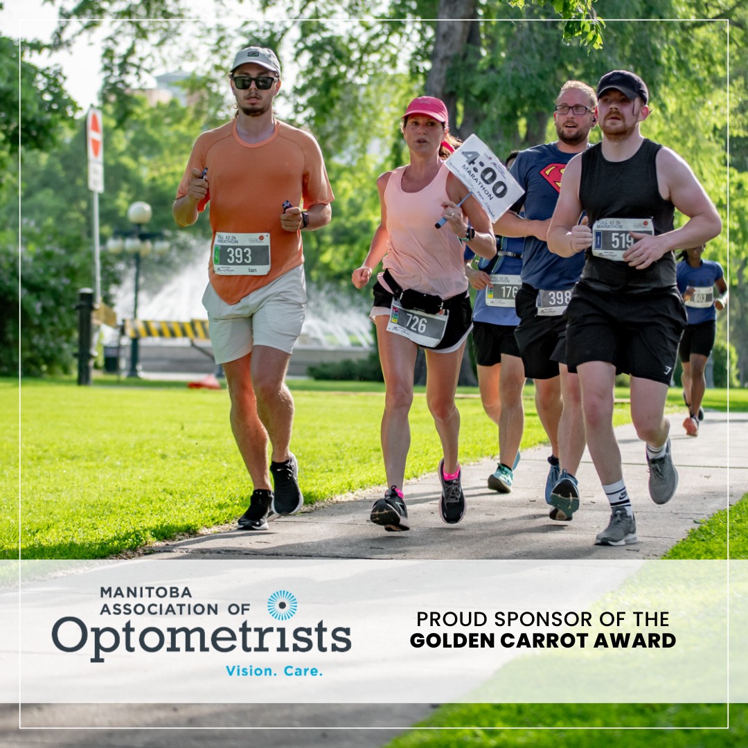 Pictured is a group of runners and a banner that says Mantiba Association of Optometrists, proud sponsors of the golden carrot award. 